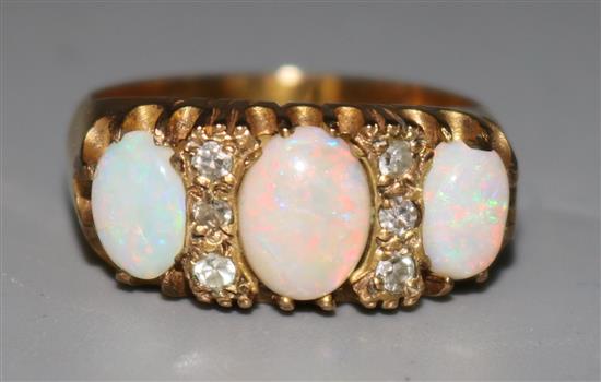 A 9ct gold, white opal and diamond half hoop ring, size Q.